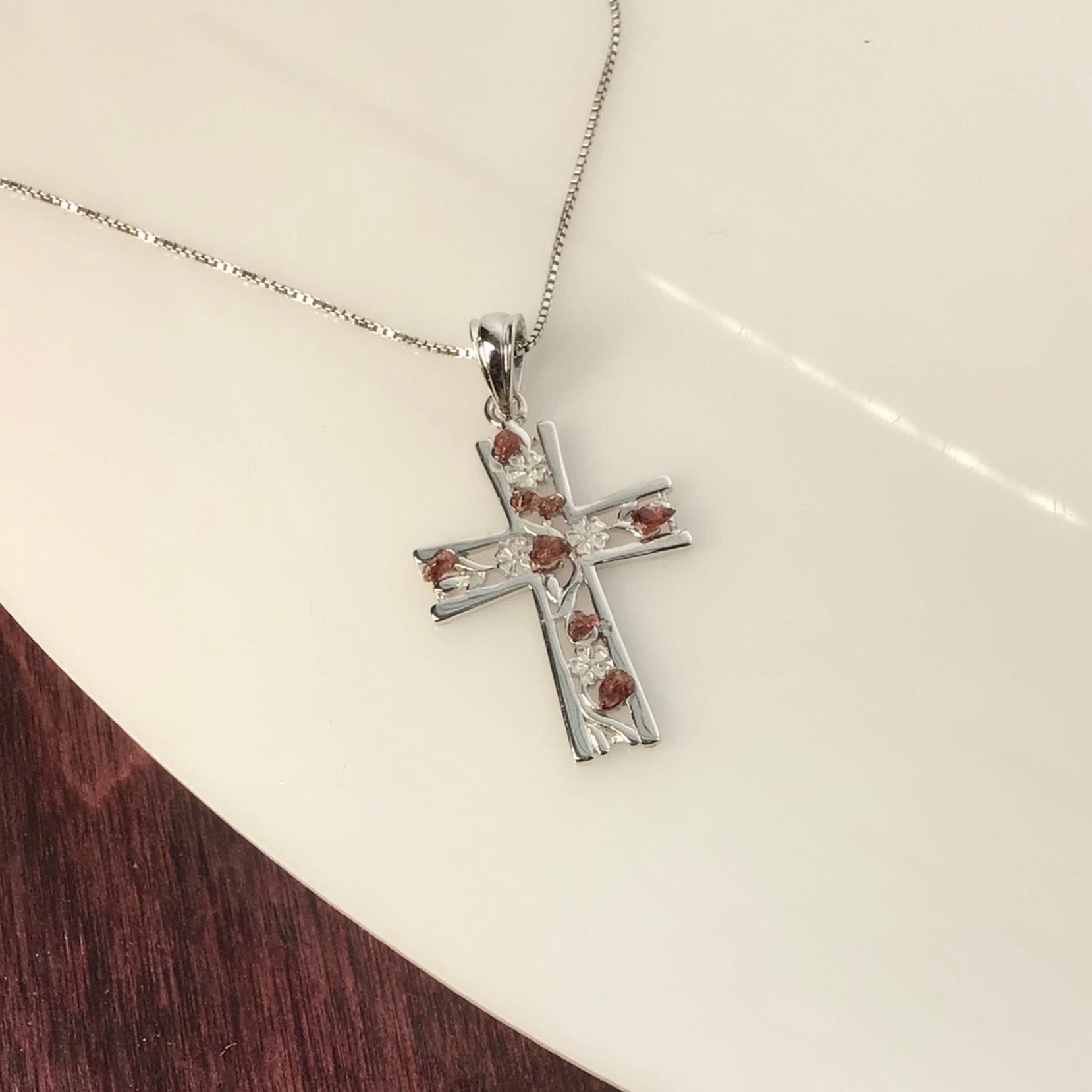0.25 Total Carat Weight (TCW) Garnet on a Rhodium Plated Sterling Silver Cross & Rhodium Plated Sterling Silver 18” Box Chain