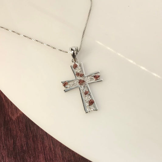 0.25 Total Carat Weight (TCW) Garnet on a Rhodium Plated Sterling Silver Cross & Rhodium Plated Sterling Silver 18” Box Chain