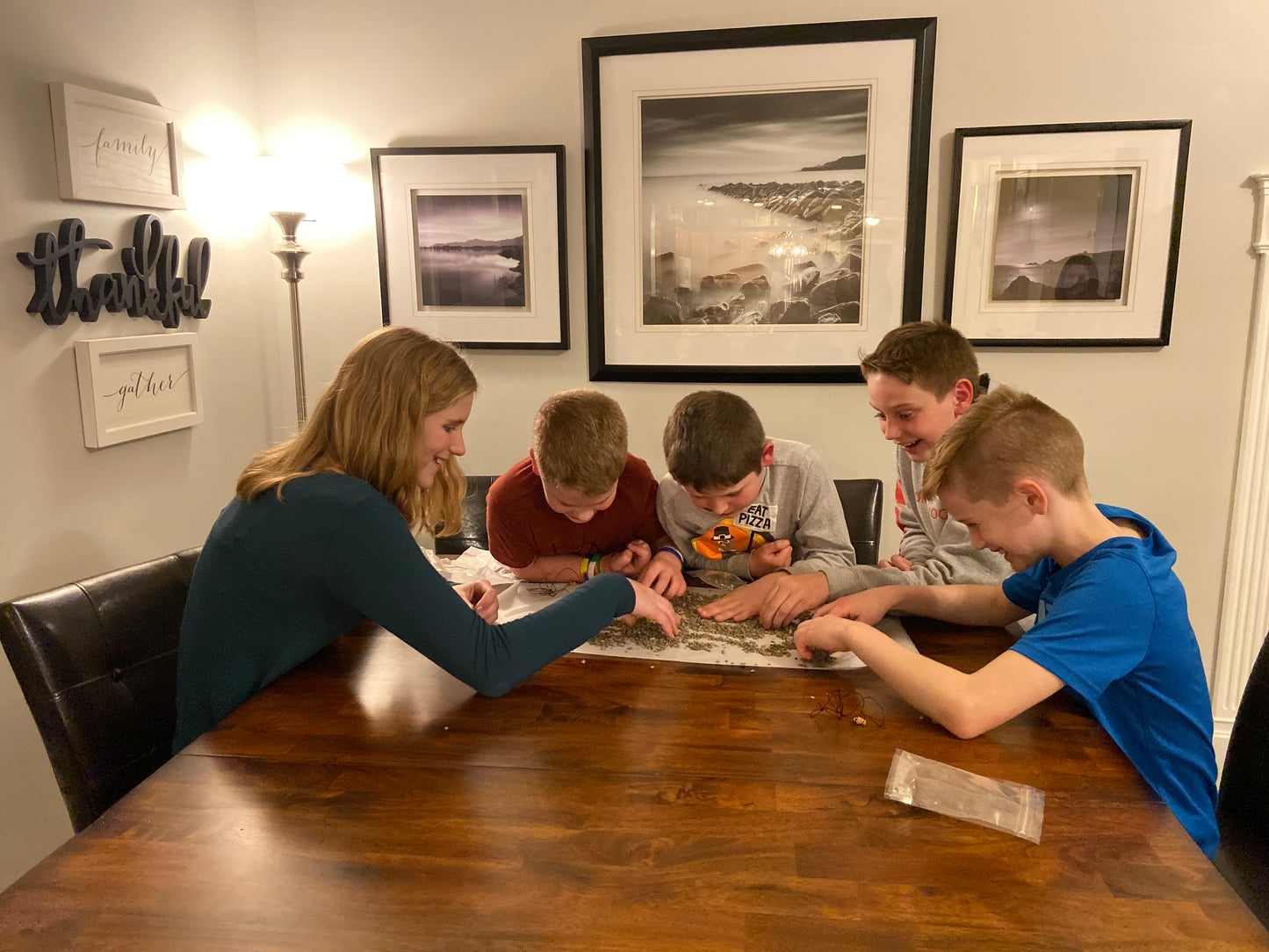 Image of boys and girls sorting through a “Mine Your Own” Herkimer Diamond Bucket