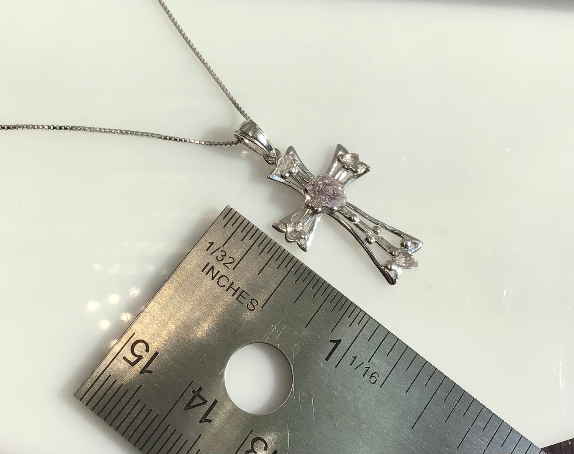 0.75 Total Carat Weight (TCW) Amethysts on Rhodium Plated Sterling Silver Cross & Rhodium Plated Sterling Silver 18” Box Chain
