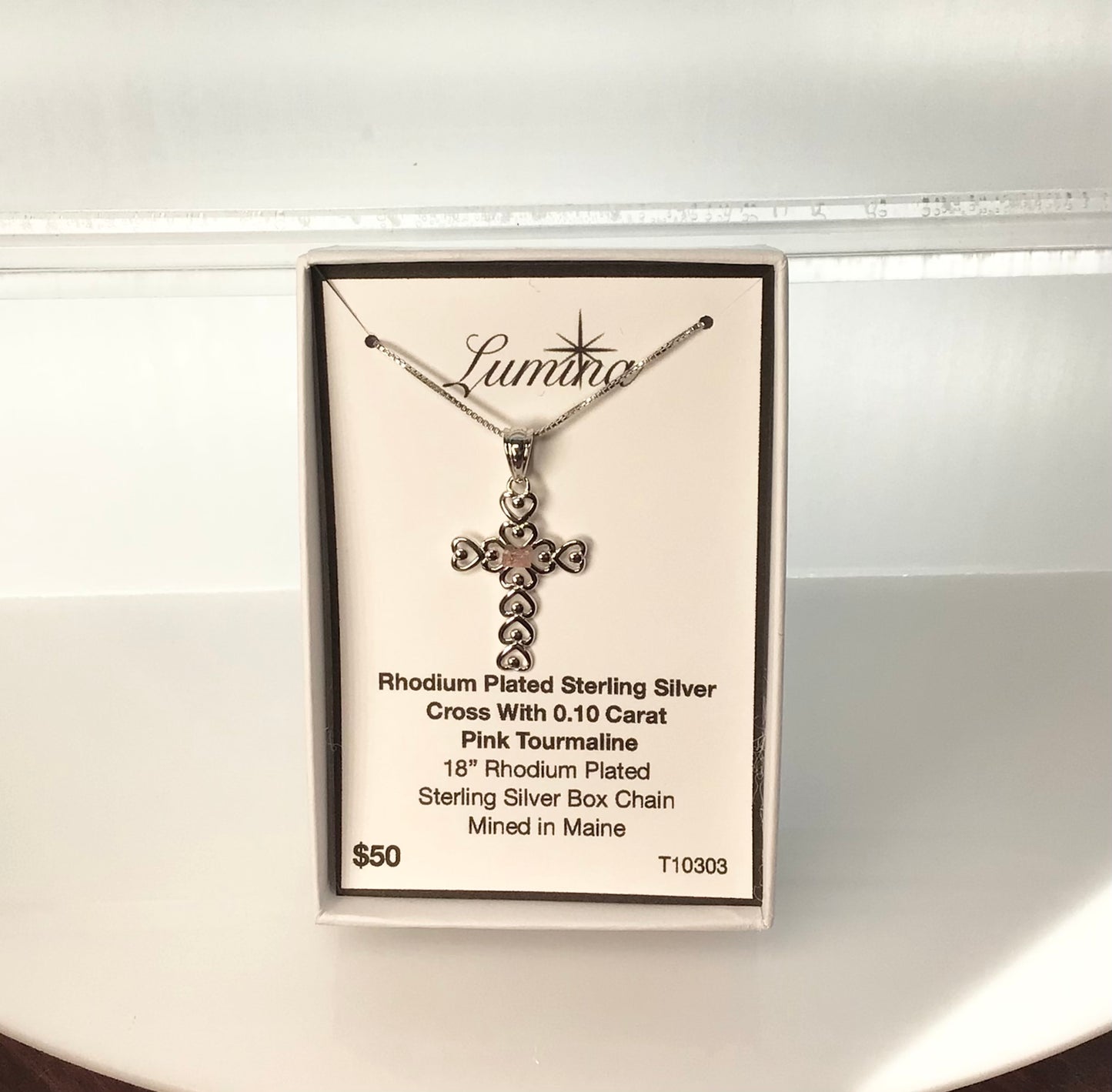 0.10 carat Pink Tourmaline on a Rhodium Plated Sterling Silver Cross & Rhodium Plated Sterling Silver 18” Box Chain