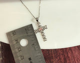 0.10 carat Pink Tourmaline on a Rhodium Plated Sterling Silver Cross & Rhodium Plated Sterling Silver 18” Box Chain