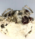 Specimen with Garnets showcasing two Argentium Silver Wrap Garnet Rings (1 ring per order. Specimen is not included