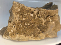 This Unique Business card holder is perfect for the office, home business or for that special someone.   This business card holder contains a micro Herkimer Diamond, Druzy and Calcite Crystals in a Dolomite Matrix.  This piece was mined in Herkimer New York.  Formed over 500 millions years ago this is a one of a kind gift that cannot be duplicated.  Business Card Gap is 1cm