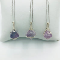 Three Argentium Silver Wire Wrapped Fluorite Octahedron Crystals on Rhodium Plated Sterling Silver Box Chains . (Left to right:. 1st is mini horizontal coil, 2nd is Large Horizontal Crystal, 3rd is Two Vertical Coils)
